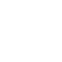 Person on ladder using a leaf blower to clean a hanging light fixture.